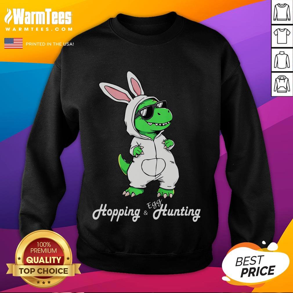 Funny Dino In Cute Easter Bunny Rabbit Costume Dinosaur Sweatshirt Alt Text: Funny dino in cute Easter bunny rabbit costume on sweatshirt, perfect for festive celebrations and dinosaur lovers.