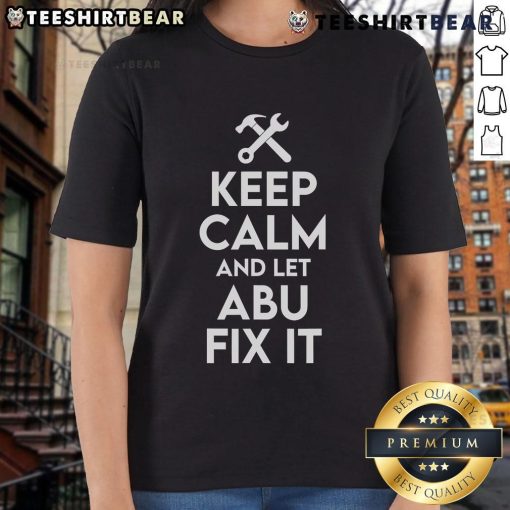 Funny 'Keep Calm And Let Abu Fix It' graphic on a ladies tee, perfect for fans of Abu the handyman and humor.