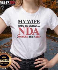 Funny ladies tee with 'My Wife Made Me Sign An NDA' graphic, perfect for humor lovers and quirky fashion enthusiasts.
