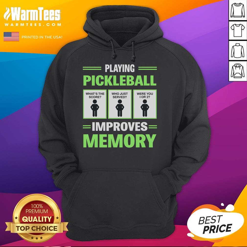 Funny Playing Pickleball Improves Memory Hoodie Person wearing a Funny Playing Pickleball Improves Memory hoodie, laughing while playing pickleball on a sunny court.