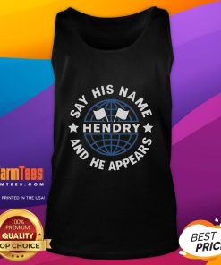 Joe Hendry wearing a tank top with the phrase 'Say His Name and He Appears' for a humorous effect.