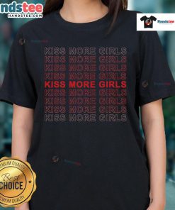 Funny Saying 'Kiss More Girls' on a stylish ladies tee, perfect for casual outings and expressing humor.