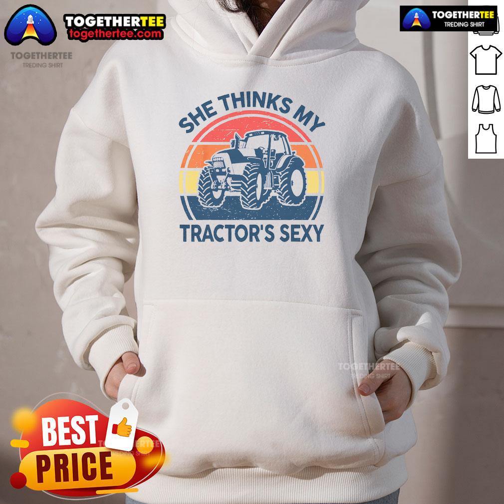 Funny She Thinks My Tractor'S Sexy Vintage Farmer Hoodie Alt Text: Vintage farmer hoodie with the phrase She Thinks My Tractor's Sexy humorously displayed, perfect for tractor lovers.