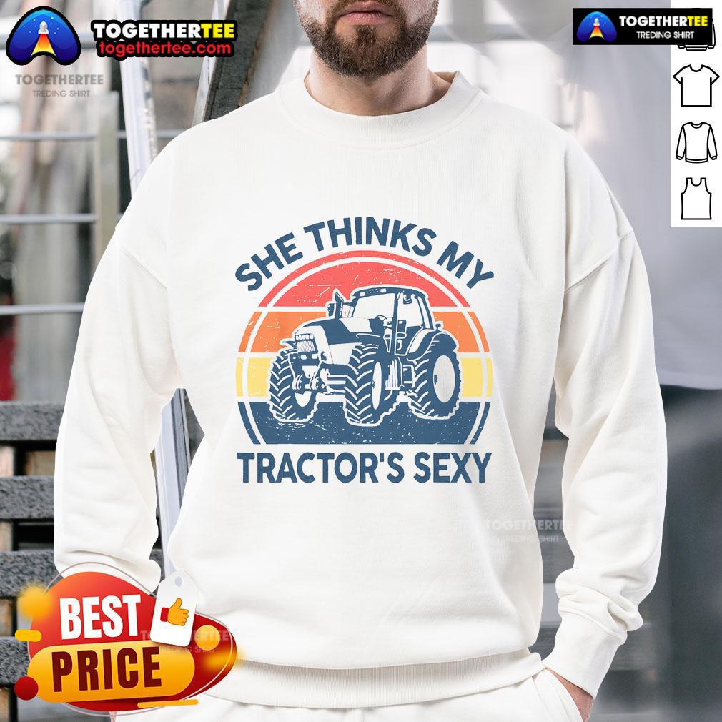 Funny She Thinks My Tractor'S Sexy Vintage Farmer Sweatshirt Alt Text: Vintage farmer sweatshirt featuring the phrase Funny, She Thinks My Tractor's Sexy in bold lettering.