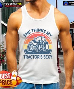 Vintage farmer tank top featuring a humorous quote: 'She thinks my tractor's sexy' with a fun design.