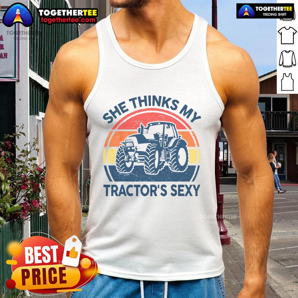 Funny She Thinks My Tractor'S Sexy Vintage Farmer Tank Top Vintage farmer tank top featuring a humorous quote: 'She thinks my tractor's sexy' with a fun design.