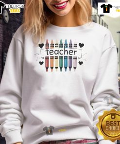 Funny teacher wearing a Temu sweatshirt, showcasing a humorous design in a classroom setting.