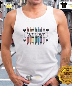 Funny teacher wearing a Sold on Temu tank top, smiling in a classroom setting, showcasing a playful and trendy style.