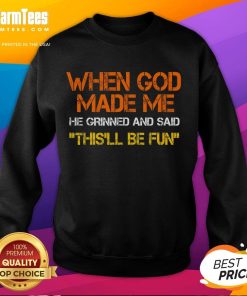 Funny sweatshirt featuring the quote 'When God made me, he grinned and said' with a sarcastic design.