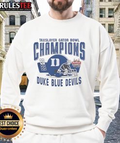 Alt Text: Duke Blue Devils helmet sweatshirt celebrating the 2025 Gator Bowl Champions, perfect for fans and collectors.