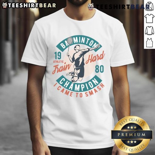 Good Badminton Champion Train Hard 1980 T-Shirt featuring a vintage design for badminton enthusiasts and sports lovers.