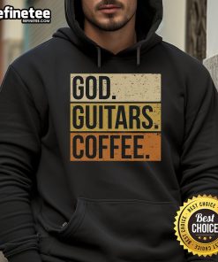 Smiling guitarist in a cozy hoodie, sipping coffee while playing a guitar, embodying the Good God Guitar vibe.