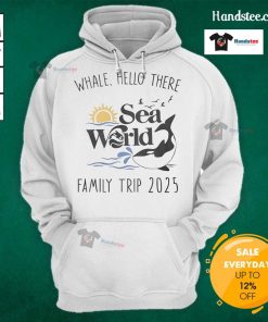 Family trip to Sea World 2025 in matching Good Whale Hello There hoodies, showcasing fun and togetherness.
