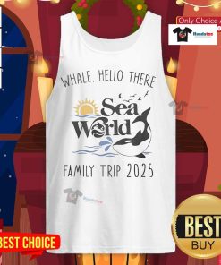 Family wearing 'Good Whale, Hello There' tank tops at Sea World during their 2025 trip, enjoying marine life together.