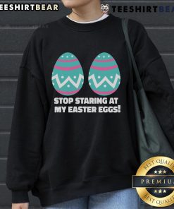 Happy Easter Funny Sweatshirt with 'Stop Staring at My Easter Eggs' graphic design, perfect for festive celebrations.