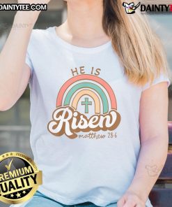 Alt Text: Vintage Easter ladies tee featuring a colorful rainbow cross with the phrase Happy He Is Risen. Perfect for Easter celebrations.