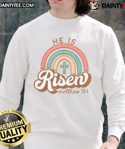 Alt Text: Vintage Easter sweatshirt featuring a vibrant rainbow cross and the phrase Happy He Is Risen for festive spring celebrations.