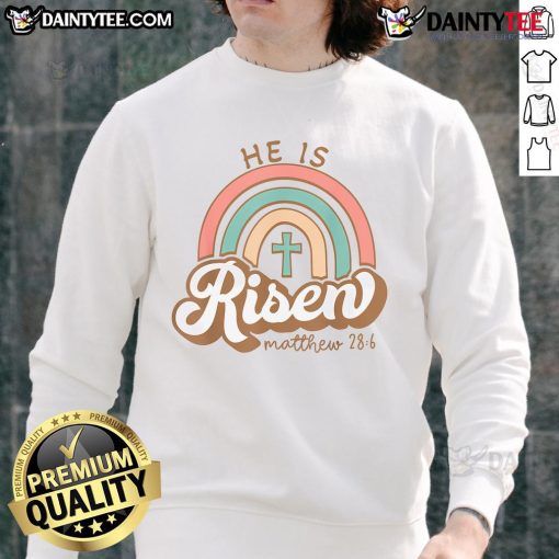 Alt Text: Vintage Easter sweatshirt featuring a vibrant rainbow cross and the phrase Happy He Is Risen for festive spring celebrations.