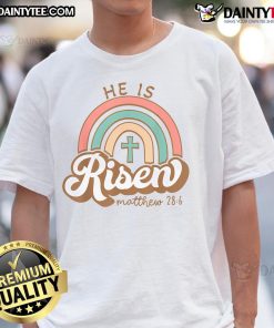 Vintage Easter T-Shirt featuring a rainbow cross and the text 'Happy He Is Risen' for festive spring celebrations.