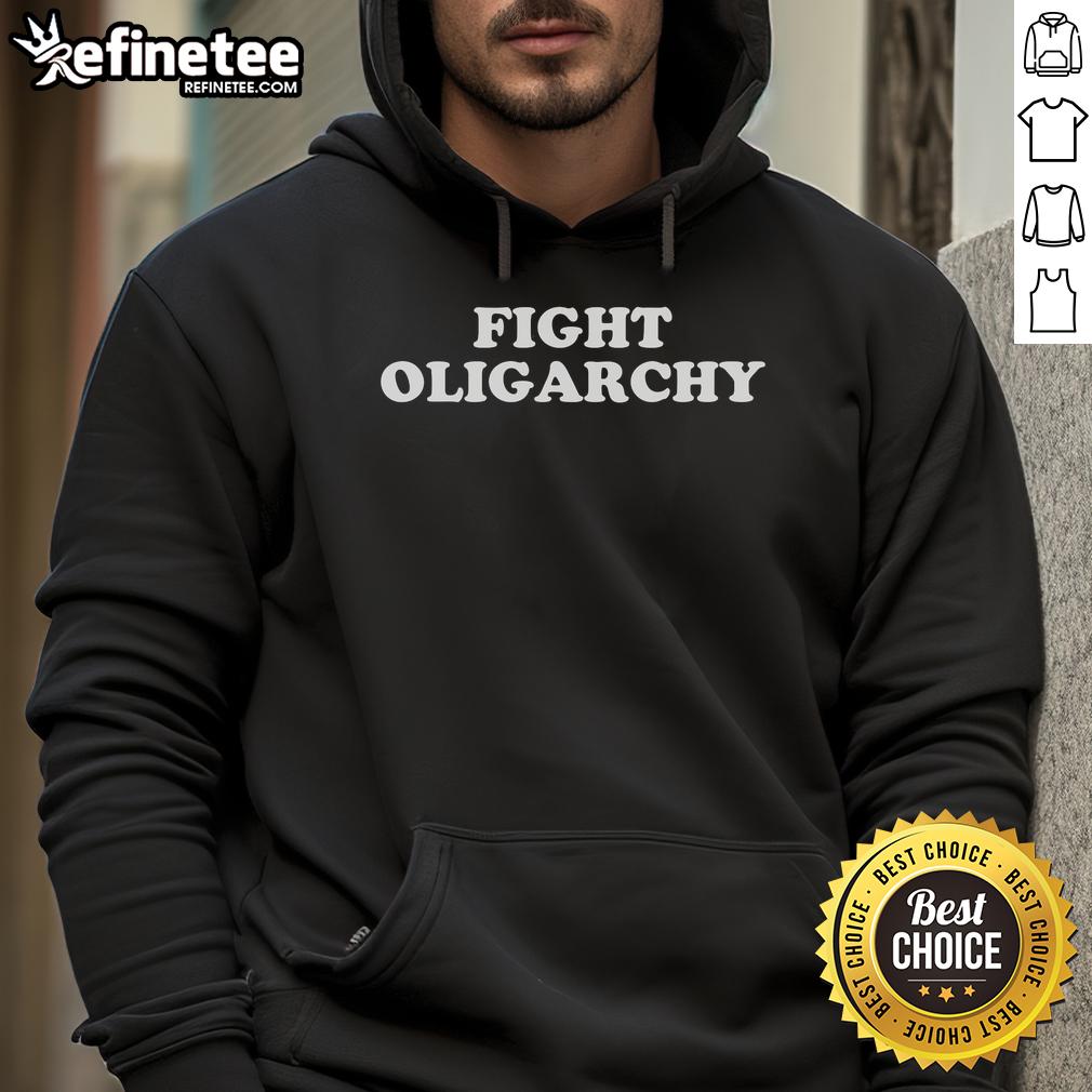Hot Fight Oligarchy Stand Against Corporate Greed Activist Hoodie Activist wearing a 'Hot Fight Oligarchy' hoodie, standing boldly against corporate greed in a dynamic protest scene.