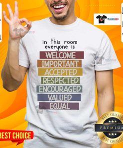 Hot Idaho teacher wearing 'Everyone Is Welcome Here' T-shirt, promoting fist-hand support in the classroom.