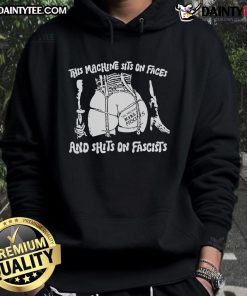 Hot This Machine Sits On Faces And Shits On Fascists Hoodie - bold graphic design on a stylish black hoodie.