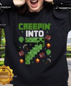Alt Text: Cute gamer sweatshirt for a 7th birthday party featuring pixel art design and 'Creepin Into 7' theme.