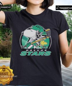 Nice Charlie Brown and Woodstock graphic on Dallas Stars Peanuts x NHL ladies tee, perfect for fans and collectors.