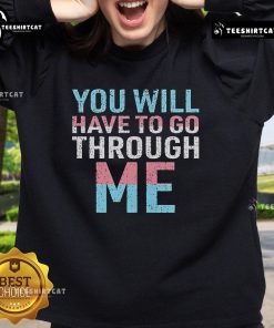 David Tennant inspired 'You Will Have To Go Through Me' trans sweatshirt in vibrant colors, perfect for fans and allies.