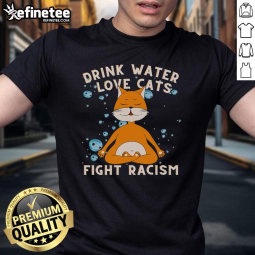 Cat mom wearing a 'Nice Drink Water Love Cats Fight Racism' T-shirt, showcasing love for cats and anti-racism message.