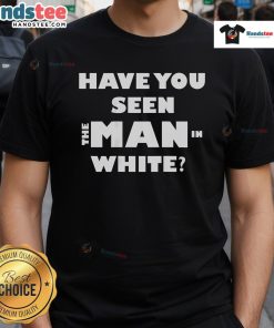 Man in a white t-shirt smiling outdoors, featured in 'Nice Have You Seen The Man In White T-Shirt' image.