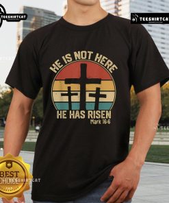 Alt Text: Retro vintage Easter T-shirt featuring He Has Risen, He Is Not Here design with Jesus graphic. Perfect for Easter celebrations.