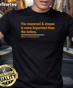 Funny Thanksgiving T-Shirt featuring 'Nice Mac & Cheese Is More Important Than Turkey' slogan for festive celebrations.