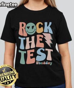 Alt Text: Teacher and student in a retro groovy rock tee on testing day, showcasing a fun and relaxed classroom atmosphere.
