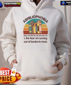Vintage hoodie featuring the phrase 'Abibliophobia: The Fear of Running Out of Books' perfect for book lovers.