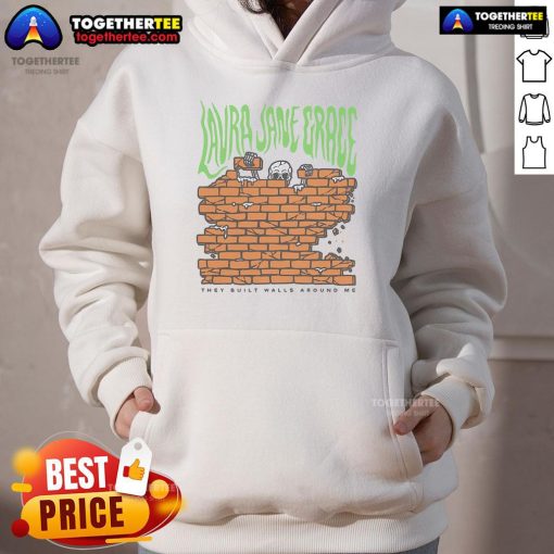 Alt Text: Laura Jane Grace wearing a skeleton hoodie from 'Walls They Built Around Me' album artwork.