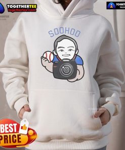 Jon Soohoo, official Los Angeles team photographer, wearing a hoodie while capturing sports moments.