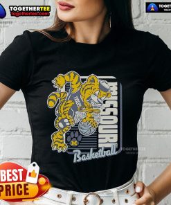 Alt Text: Official Missouri Tigers basketball mascot dunking in a ladies tee, showcasing team spirit and pride in women's sports.