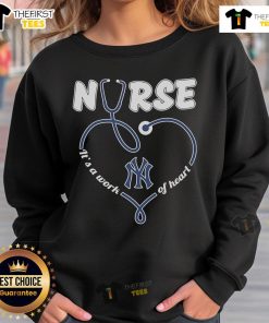 Official New York Yankees Nurse sweatshirt featuring 'It's a Work of Heart' design, perfect for fans and healthcare workers.