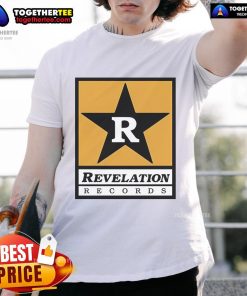 Official R Star Revelation Records T-Shirt featuring vibrant logo design on a stylish black fabric background.
