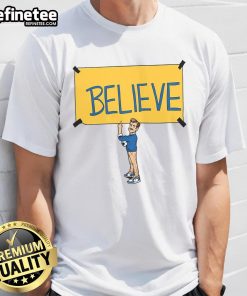 Alt Text: Official Ted Lasso Believe T-Shirt featuring a motivational design with the iconic Believe slogan in bold lettering.