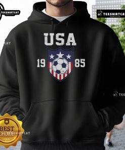 Official USA Soccer Team 1985 hoodie featuring classic design and vibrant team colors, perfect for fans and collectors.