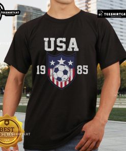 Official USA Soccer Team 1985 T-Shirt featuring vintage design and patriotic colors, perfect for soccer fans and collectors.