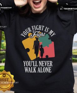 Mother and child wearing 'Your Fight My Fight' Autism Awareness sweatshirts, showcasing love and support for autism advocacy.