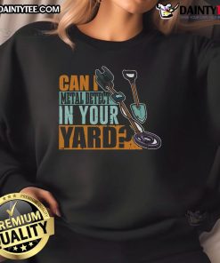 Cozy 'Can I Metal Detect In Your Yard' sweatshirt featuring a metal detector graphic, perfect for metal detecting enthusiasts.