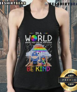 Pretty Charlie Brown and Snoopy New York Knicks tank top, featuring 'In a world where you can be anything, be kind' slogan.