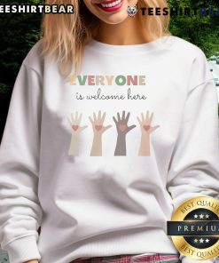 Alt Text: Pretty Everyone Is Welcome Here Sweatshirt in vibrant colors, showcasing a cozy design perfect for inclusive fashion.