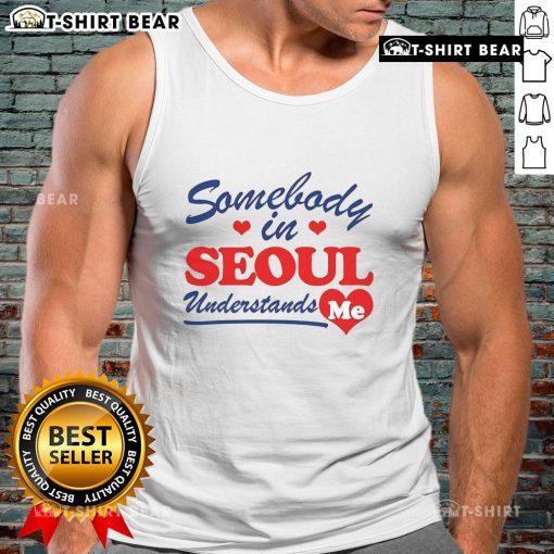 Stylish woman wearing a 'Pretty Somebody In Seoul Understands Me' tank top, enjoying the vibrant streets of Seoul.