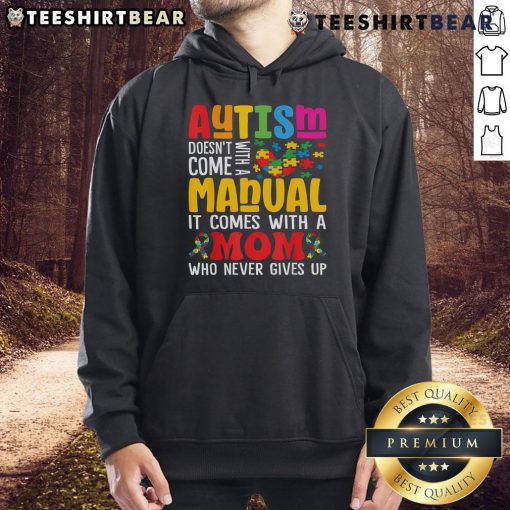Mom wearing a hoodie that reads 'Top Autism Mom Life Doesn't Come With a Manual' for Autism Awareness.
