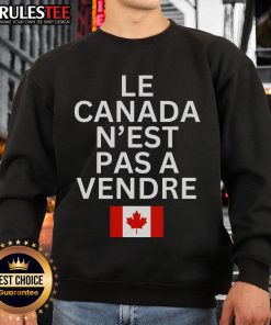 Alt Text: Top Canada is Not for Sale sweatshirt in French, Le Canada N'est Pas Vendre, showcasing bold text design.